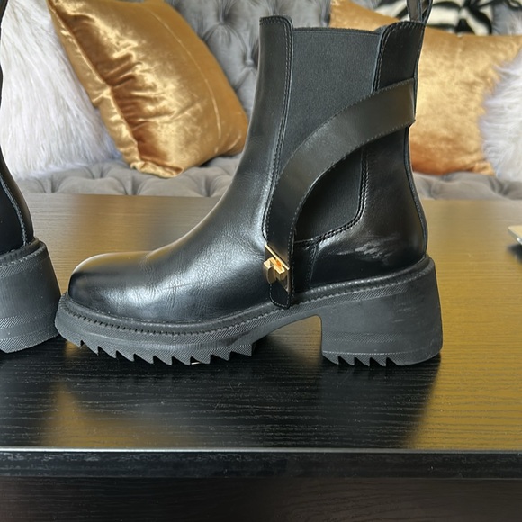 Steve Madden Black Leather Ankle Boots with gold accent. - Picture 9 of 15